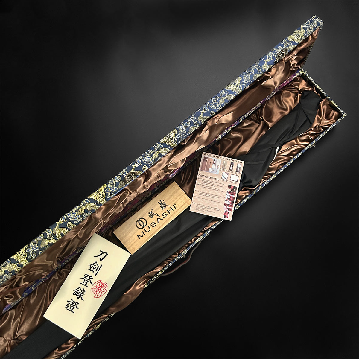 Musashi "Umigame" Katana in a decorative box with accessories.