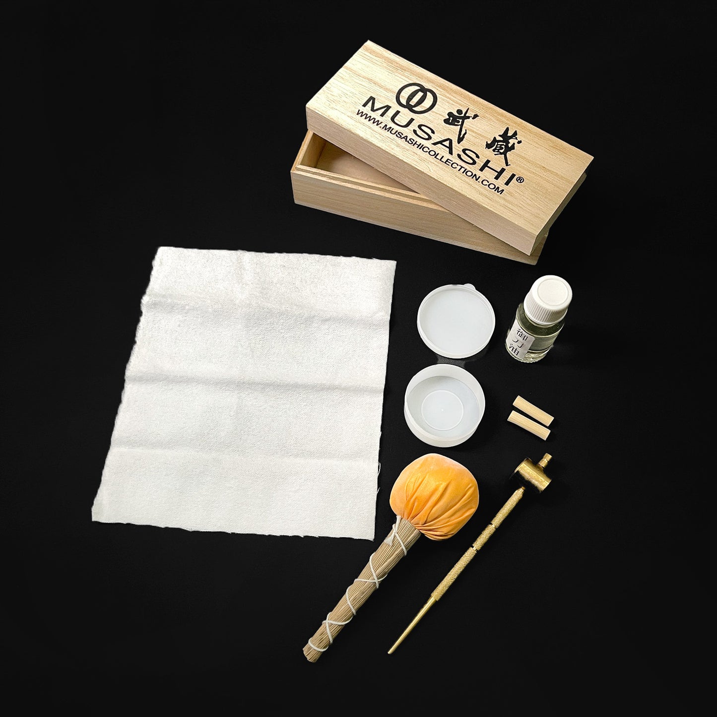 Musashi Samurai Sword Maintenance Kit with wooden box, cleaning cloth, oil bottle, powder container, and traditional cleaning tools
