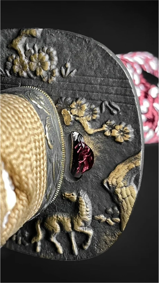 Hand-forged katana by Musashi Swords - tsuba close-up
